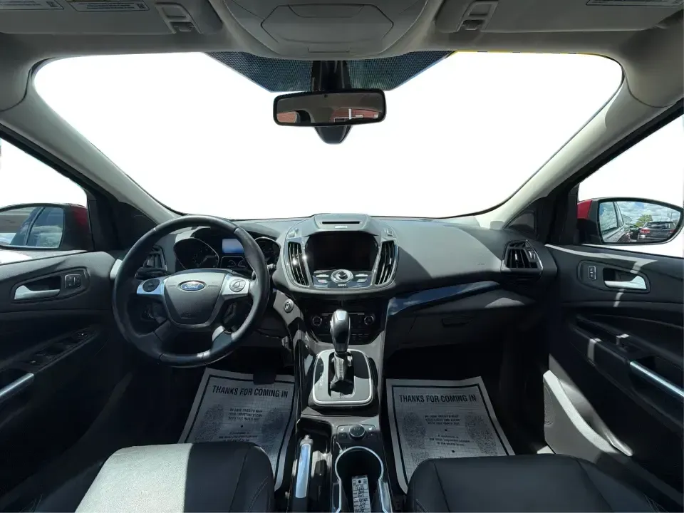 2014 Ford Escape Titanium 4WD (1FMCU9J91EU) with an 2.0L L4 DOHC 16V engine, 6-Speed Automatic transmission, located at 1099 N County Rd 25A , Troy, OH, 45373, (937) 908-9800, 40.057079, -84.212883 - Weekend getaways to Hocking Hills, snowy commutes up I75, or the everyday school-and-grocery loop around Troy-this 2014 Ford Escape Titanium 4WD is built for the kind of life that doesn't slow down when the weather changes. With seating for five, flexible cargo space, and confident four-wheel drive,- Photo#22