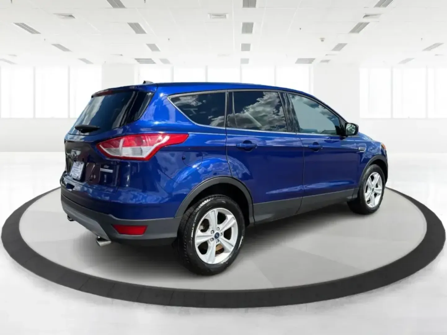 2016 Ford Escape SE FWD (1FMCU0G94GU) with an 2.0L L4 DOHC 16V engine, 6-Speed Automatic transmission, located at 1099 N County Rd 25A , Troy, OH, 45373, (937) 908-9800, 40.057079, -84.212883 - Pack up the kids, load the groceries, or point the nose toward a weekend getaway-this 2016 Ford Escape SE FWD is the kind of compact SUV that fits real life in Troy, Ohio. With seating for five, versatile cargo space, and fuel-friendly efficiency (23 city / 32 highway MPG), it's a smart match for co- Photo#2
