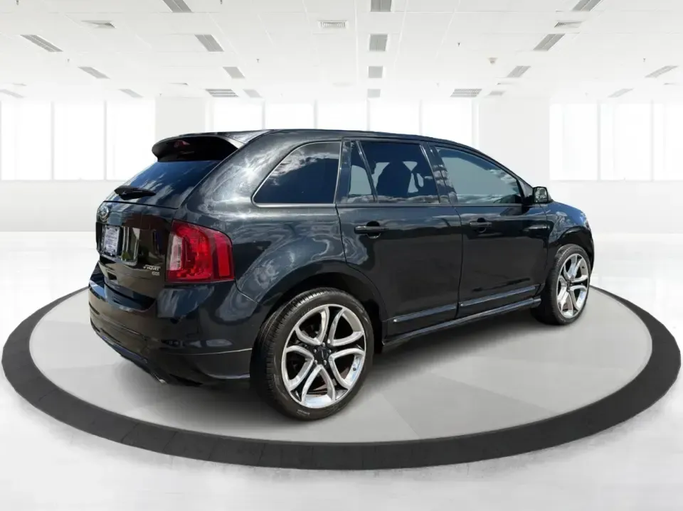 2014 Ford Edge Sport AWD (2FMDK4AK1EB) with an 3.7L V6 DOHC 24V engine, 6-Speed Automatic transmission, located at 8750 N County Rd 25A, Piqua, OH, 45356, (937) 908-9800, 40.164391, -84.232513 - Need an SUV that can handle Ohio weather, busy school weeks, and spontaneous weekend getaways without feeling like a compromise? This 2014 Ford Edge Sport AWD is built for real life-confident on rainy commutes, comfortable for family errands, and ready for road trips from Piqua to Dayton with the po- Photo#2