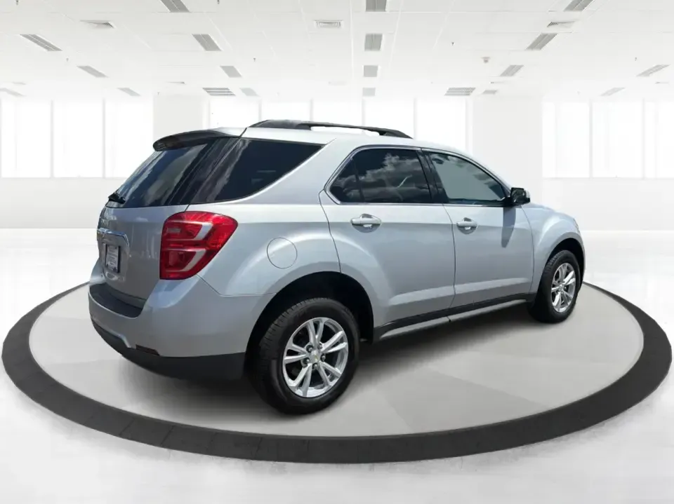 2017 Chevrolet Equinox LT AWD (2GNFLFEK1H6) with an 2.4L L4 DOHC 16V FFV engine, 6A transmission, located at 1951 S Dayton Lakeview Rd., New Carlisle, OH, 45344, (937) 908-9800, 39.890999, -84.050255 - Need one SUV that can handle weekday commutes, school drop-offs, and spontaneous weekend getaways to John Bryan State Park or Buck Creek-without feeling bulky in town? This 2017 Chevrolet Equinox LT AWD in Silver Ice Metallic is a smart fit for life in and around New Carlisle, Ohio, offering confide- Photo#2
