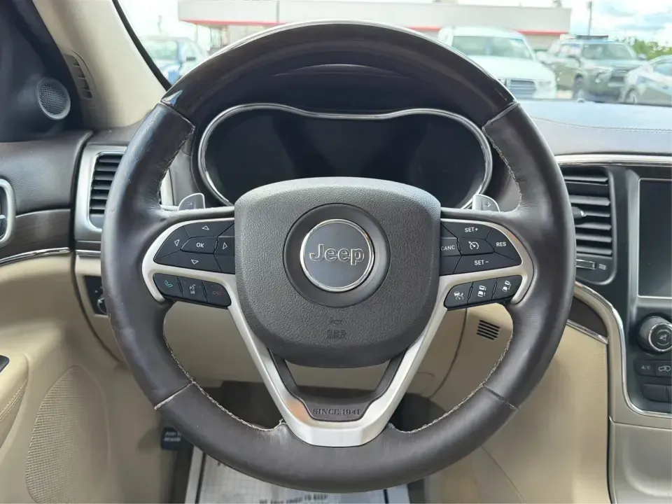2015 Jeep Grand Cherokee Overland 4WD (1C4RJFCT9FC) with an 5.7L V8 OHV 16V engine, 8-Speed Automatic transmission, located at 8750 N County Rd 25A, Piqua, OH, 45356, (937) 908-9800, 40.164391, -84.232513 - Pack up the family, hitch up the boat, or point the nose toward a weekend escape at Indian Lake-this 2015 Jeep Grand Cherokee Overland 4WD is built for the kind of life that doesn't stop when the forecast changes. With its V8 power, upscale cabin, and confident four-wheel drive, it's an SUV that fit- Photo#16