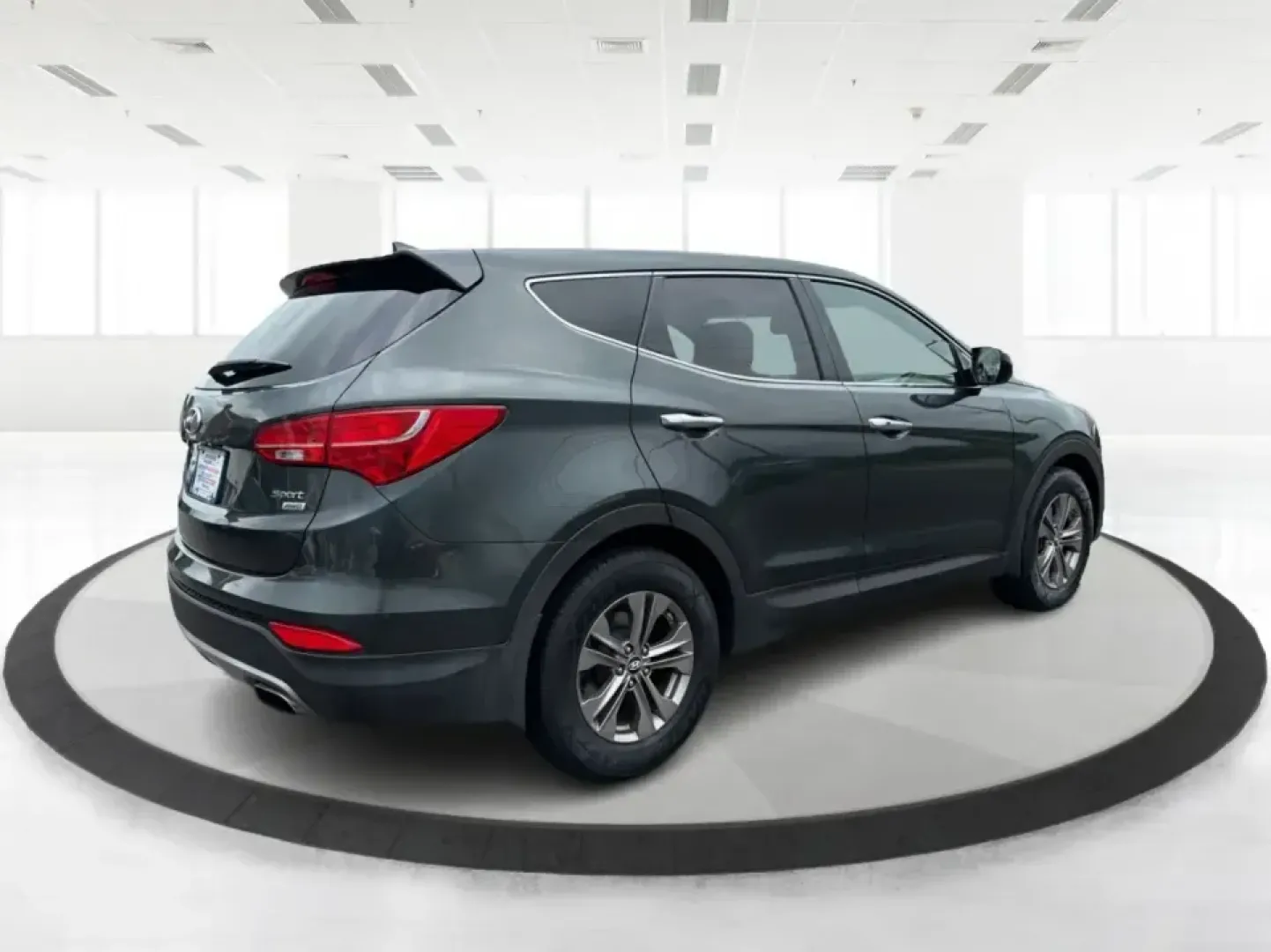 2013 Hyundai Santa Fe Sport 2.4 AWD (5XYZUDLB6DG) with an 2.4L L4 DOHC 16V engine, 6-Speed Automatic transmission, located at 1230 East Main St, Xenia, OH, 45385, (937) 908-9800, 39.688026, -83.910172 - Pack up the kids, the cooler, and the weekend plans-this 2013 Hyundai Santa Fe Sport 2.4 AWD is the kind of SUV that fits real life in Xenia. Whether you're commuting up US-35 toward Dayton, running errands around Downtown Xenia, or heading out for a family afternoon at Shawnee Park, this Santa Fe b- Photo#2