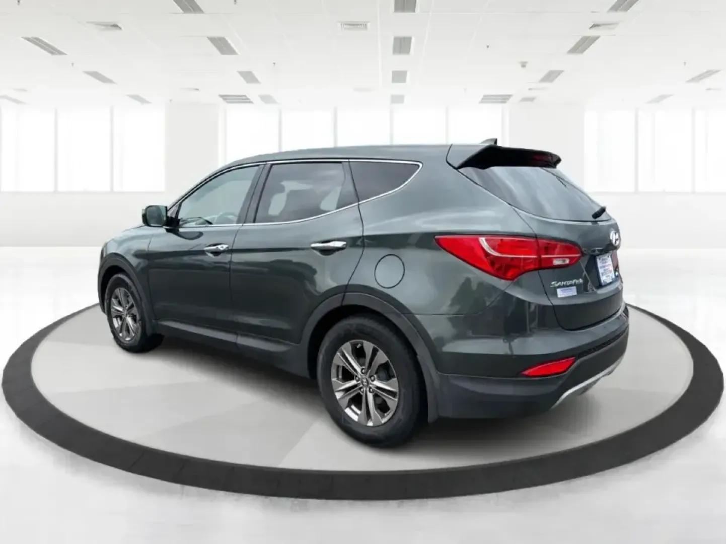 2013 Hyundai Santa Fe Sport 2.4 AWD (5XYZUDLB6DG) with an 2.4L L4 DOHC 16V engine, 6-Speed Automatic transmission, located at 1230 East Main St, Xenia, OH, 45385, (937) 908-9800, 39.688026, -83.910172 - Pack up the kids, the cooler, and the weekend plans-this 2013 Hyundai Santa Fe Sport 2.4 AWD is the kind of SUV that fits real life in Xenia. Whether you're commuting up US-35 toward Dayton, running errands around Downtown Xenia, or heading out for a family afternoon at Shawnee Park, this Santa Fe b- Photo#4