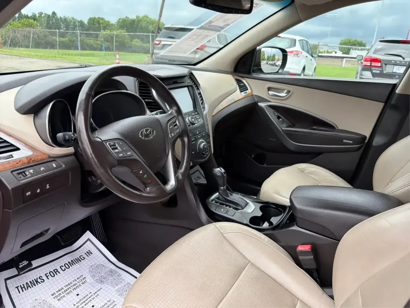 2013 Hyundai Santa Fe Sport 2.4 AWD (5XYZUDLB6DG) with an 2.4L L4 DOHC 16V engine, 6-Speed Automatic transmission, located at 1230 East Main St, Xenia, OH, 45385, (937) 908-9800, 39.688026, -83.910172 - Pack up the kids, the cooler, and the weekend plans-this 2013 Hyundai Santa Fe Sport 2.4 AWD is the kind of SUV that fits real life in Xenia. Whether you're commuting up US-35 toward Dayton, running errands around Downtown Xenia, or heading out for a family afternoon at Shawnee Park, this Santa Fe b- Photo#9