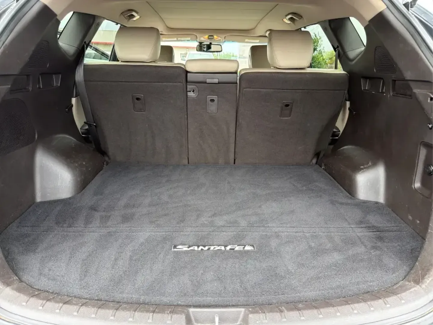 2013 Hyundai Santa Fe Sport 2.4 AWD (5XYZUDLB6DG) with an 2.4L L4 DOHC 16V engine, 6-Speed Automatic transmission, located at 1230 East Main St, Xenia, OH, 45385, (937) 908-9800, 39.688026, -83.910172 - Pack up the kids, the cooler, and the weekend plans-this 2013 Hyundai Santa Fe Sport 2.4 AWD is the kind of SUV that fits real life in Xenia. Whether you're commuting up US-35 toward Dayton, running errands around Downtown Xenia, or heading out for a family afternoon at Shawnee Park, this Santa Fe b- Photo#12