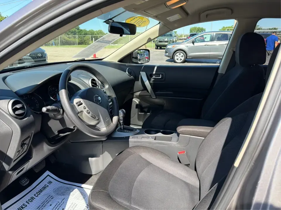 2013 Nissan Rogue S 2WD (JN8AS5MT0DW) with an 2.5L L4 DOHC 16V engine, Continuously Variable Transmission transmission, located at 1951 S Dayton Lakeview Rd., New Carlisle, OH, 45344, (937) 908-9800, 39.890999, -84.050255 - Ready for a smoother daily commute and easy weekend getaways around Clark County? This 2013 Nissan Rogue S 2WD is the kind of practical SUV that fits real life-school drop-offs, grocery runs, and road trips from New Carlisle to Dayton-without feeling bulky or hard to park. Finished in Frosted Steel- Photo#9
