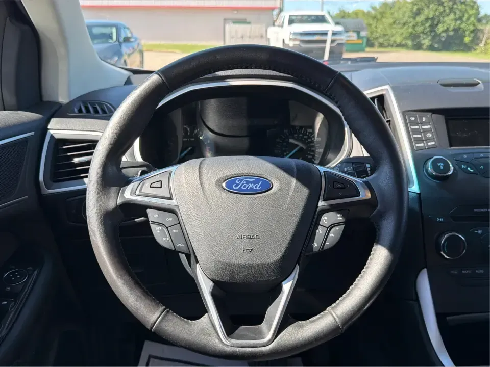 2015 Ford Edge SEL AWD (2FMTK4J87FB) with an 3.5L V6 DOHC 24V engine, 6-Speed Automatic transmission, located at 1184 Kauffman Ave, Fairborn, OH, 45324, (937) 908-9800, 39.807072, -84.030914 - Weekend road trips to Yellow Springs, snowy commutes to Wright-Patterson AFB, and everyday school-drop runs around Fairborn all call for an SUV that feels confident, comfortable, and easy to live with. This 2015 Ford Edge SEL AWD is built for real life in Ohio-room for five, versatile cargo space, a- Photo#16
