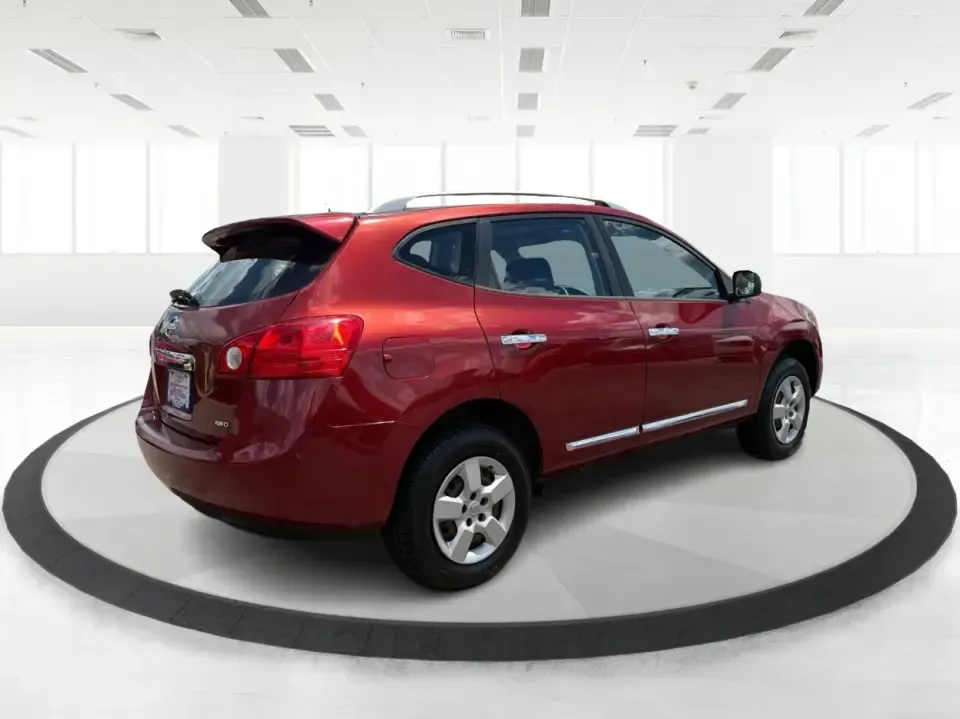 2015 Nissan Rogue S AWD (JN8AS5MV1FW) with an 2.5L L4 DOHC 16V engine, Continuously Variable Transmission transmission, located at 8750 N County Rd 25A, Piqua, OH, 45356, (937) 908-9800, 40.164391, -84.232513 - When your week is packed with school drop-offs, I-75 commutes, and weekend runs to Indian Lake, you need an SUV that's comfortable, confident in Ohio weather, and easy to live with. This 2015 Nissan Rogue S AWD in eye-catching Cayenne Red is built for real life in Piqua-roomy for five, efficient for- Photo#2