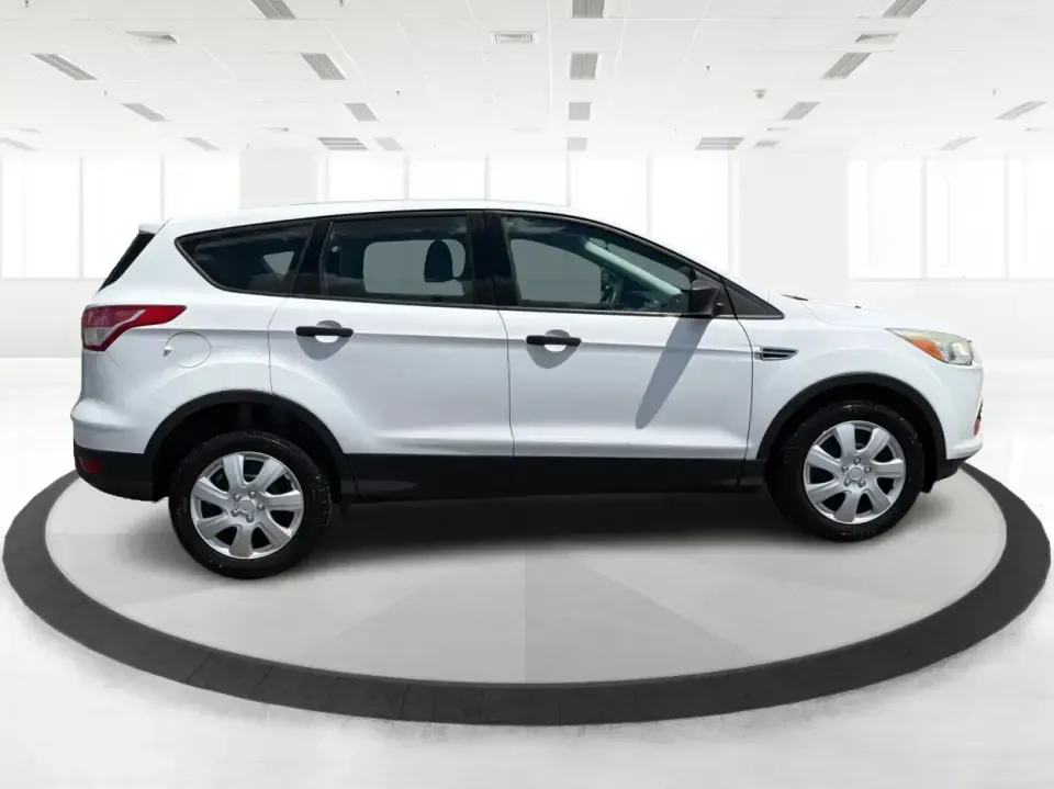 2014 Ford Escape S FWD (1FMCU0F75EU) with an 2.5L L4 DOHC 16V engine, 6-Speed Automatic transmission, located at 1184 Kauffman Ave, Fairborn, OH, 45324, (937) 908-9800, 39.807072, -84.030914 - Need a practical SUV that fits real life in the Miami Valley-school drop-offs, Wright-Patterson AFB commutes, grocery runs, and weekend getaways to John Bryan State Park? This 2014 Ford Escape S FWD in Oxford White is a smart, budget-friendly choice with the versatility to handle busy schedules and- Photo#1