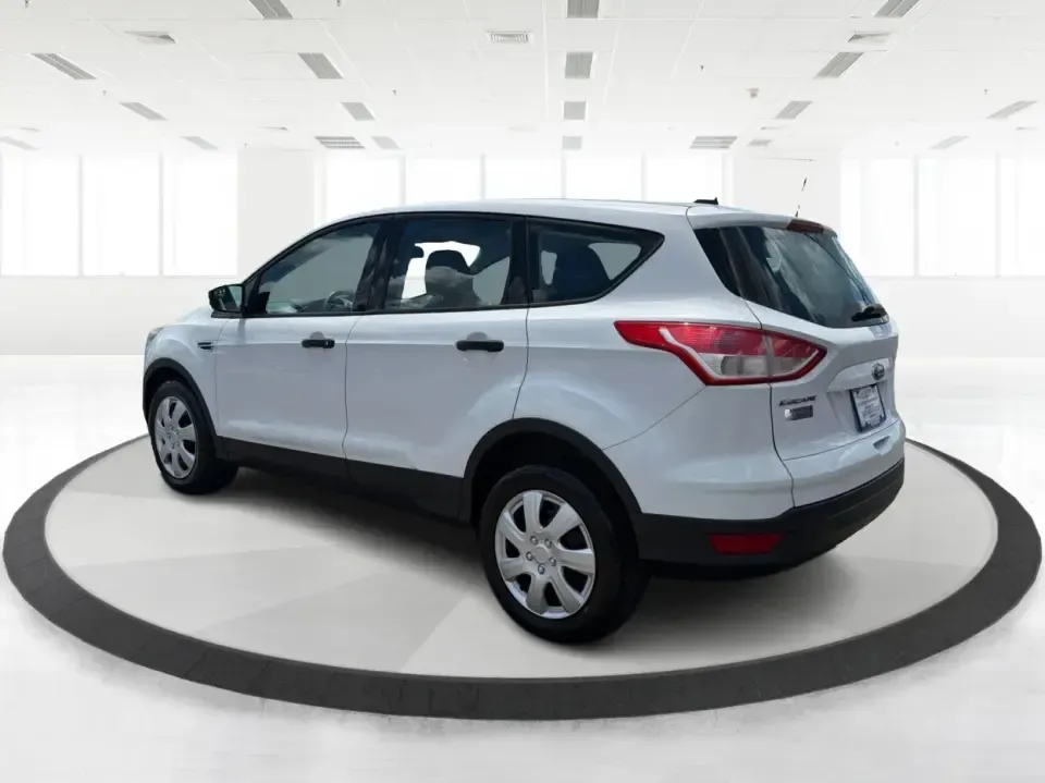 2014 Ford Escape S FWD (1FMCU0F75EU) with an 2.5L L4 DOHC 16V engine, 6-Speed Automatic transmission, located at 1184 Kauffman Ave, Fairborn, OH, 45324, (937) 908-9800, 39.807072, -84.030914 - Need a practical SUV that fits real life in the Miami Valley-school drop-offs, Wright-Patterson AFB commutes, grocery runs, and weekend getaways to John Bryan State Park? This 2014 Ford Escape S FWD in Oxford White is a smart, budget-friendly choice with the versatility to handle busy schedules and- Photo#4