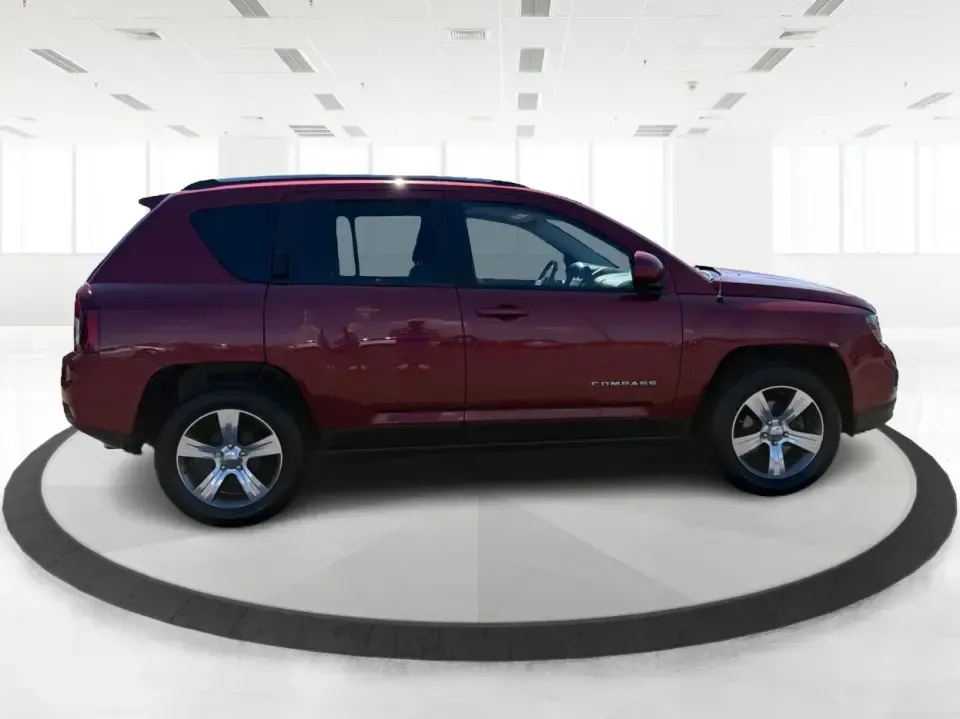 2017 Jeep Compass Latitude FWD (1C4NJCEB2HD) with an 2.4L L4 DOHC 16V engine, CVT transmission, located at 4508 South Dixie Dr, Moraine, OH, 45439, (937) 908-9800, 39.689976, -84.218452 - Weekend plans, daily commutes, and quick getaways around the Miami Valley feel easier when you've got a compact SUV that's comfortable, efficient, and ready for real life. This **2017 Jeep Compass Latitude FWD** in eye-catching **Deep Cherry Red Crystal Pearlcoat** is a smart fit for drivers who wan - Photo#1