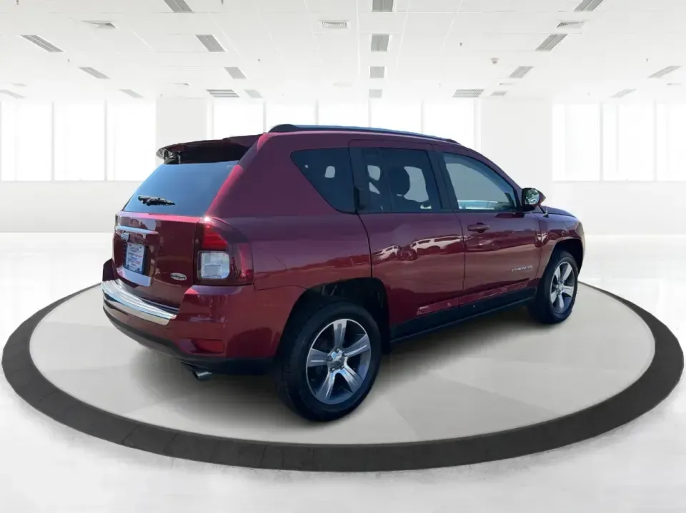 2017 Jeep Compass Latitude FWD (1C4NJCEB2HD) with an 2.4L L4 DOHC 16V engine, CVT transmission, located at 4508 South Dixie Dr, Moraine, OH, 45439, (937) 908-9800, 39.689976, -84.218452 - Weekend plans, daily commutes, and quick getaways around the Miami Valley feel easier when you've got a compact SUV that's comfortable, efficient, and ready for real life. This **2017 Jeep Compass Latitude FWD** in eye-catching **Deep Cherry Red Crystal Pearlcoat** is a smart fit for drivers who wan - Photo#2