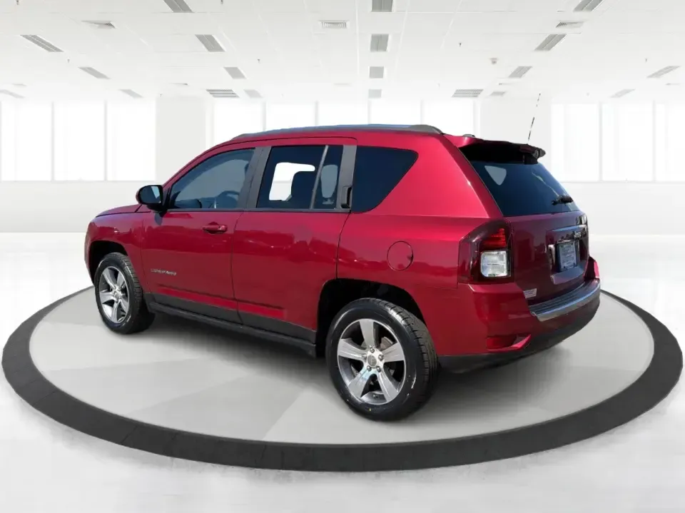 2017 Jeep Compass Latitude FWD (1C4NJCEB2HD) with an 2.4L L4 DOHC 16V engine, CVT transmission, located at 4508 South Dixie Dr, Moraine, OH, 45439, (937) 908-9800, 39.689976, -84.218452 - Weekend plans, daily commutes, and quick getaways around the Miami Valley feel easier when you've got a compact SUV that's comfortable, efficient, and ready for real life. This **2017 Jeep Compass Latitude FWD** in eye-catching **Deep Cherry Red Crystal Pearlcoat** is a smart fit for drivers who wan - Photo#4
