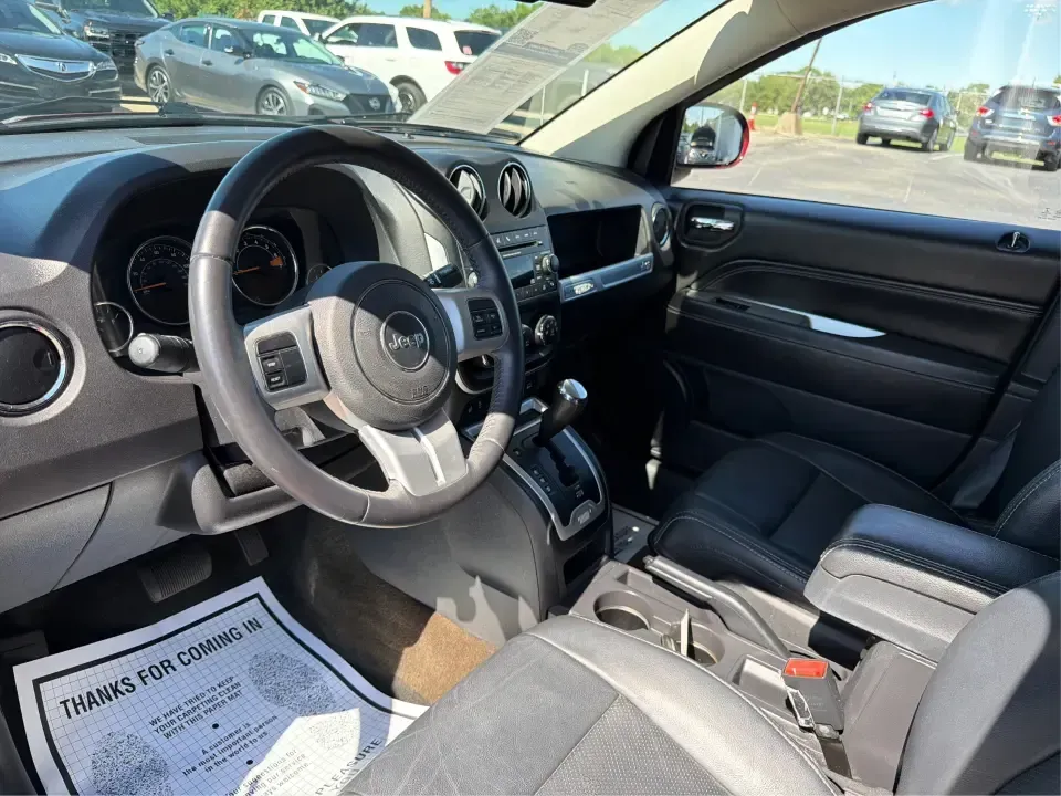 2017 Jeep Compass Latitude FWD (1C4NJCEB2HD) with an 2.4L L4 DOHC 16V engine, CVT transmission, located at 4508 South Dixie Dr, Moraine, OH, 45439, (937) 908-9800, 39.689976, -84.218452 - Weekend plans, daily commutes, and quick getaways around the Miami Valley feel easier when you've got a compact SUV that's comfortable, efficient, and ready for real life. This **2017 Jeep Compass Latitude FWD** in eye-catching **Deep Cherry Red Crystal Pearlcoat** is a smart fit for drivers who wan - Photo#9