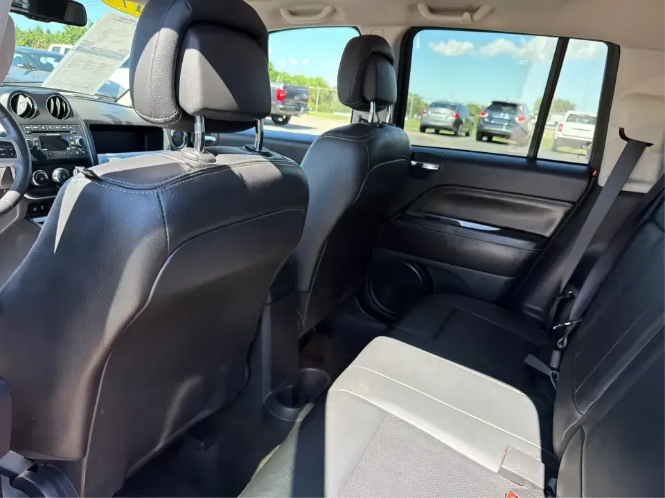 2017 Jeep Compass Latitude FWD (1C4NJCEB2HD) with an 2.4L L4 DOHC 16V engine, CVT transmission, located at 4508 South Dixie Dr, Moraine, OH, 45439, (937) 908-9800, 39.689976, -84.218452 - Weekend plans, daily commutes, and quick getaways around the Miami Valley feel easier when you've got a compact SUV that's comfortable, efficient, and ready for real life. This **2017 Jeep Compass Latitude FWD** in eye-catching **Deep Cherry Red Crystal Pearlcoat** is a smart fit for drivers who wan - Photo#10