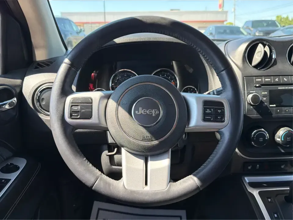 2017 Jeep Compass Latitude FWD (1C4NJCEB2HD) with an 2.4L L4 DOHC 16V engine, CVT transmission, located at 4508 South Dixie Dr, Moraine, OH, 45439, (937) 908-9800, 39.689976, -84.218452 - Weekend plans, daily commutes, and quick getaways around the Miami Valley feel easier when you've got a compact SUV that's comfortable, efficient, and ready for real life. This **2017 Jeep Compass Latitude FWD** in eye-catching **Deep Cherry Red Crystal Pearlcoat** is a smart fit for drivers who wan - Photo#15