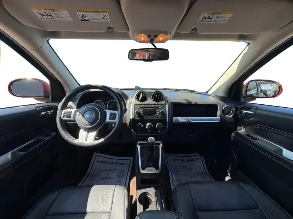 2017 Jeep Compass Latitude FWD (1C4NJCEB2HD) with an 2.4L L4 DOHC 16V engine, CVT transmission, located at 4508 South Dixie Dr, Moraine, OH, 45439, (937) 908-9800, 39.689976, -84.218452 - Weekend plans, daily commutes, and quick getaways around the Miami Valley feel easier when you've got a compact SUV that's comfortable, efficient, and ready for real life. This **2017 Jeep Compass Latitude FWD** in eye-catching **Deep Cherry Red Crystal Pearlcoat** is a smart fit for drivers who wan - Photo#18