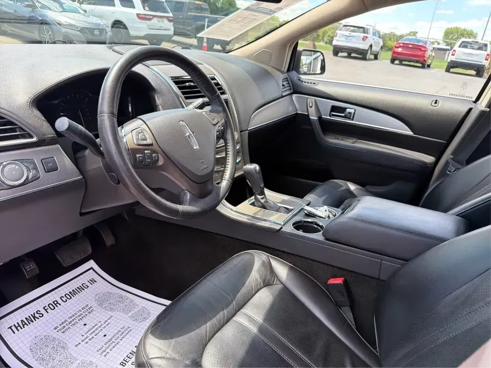 2014 Lincoln MKX AWD (2LMDJ8JK2EB) with an 3.7L V6 DOHC 24V engine, 6-Speed Automatic transmission, located at 1230 East Main St, Xenia, OH, 45385, (937) 908-9800, 39.688026, -83.910172 - Whether you're commuting from Xenia to Beavercreek, hauling the family to a weekend game, or planning a comfortable road trip out toward Yellow Springs and John Bryan State Park, this 2014 Lincoln MKX AWD is the kind of SUV that fits real life: roomy, confident in changing Ohio weather, and upscale- Photo#9