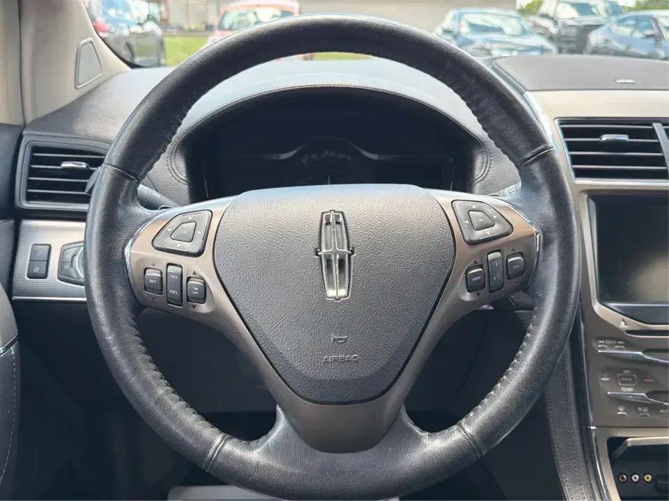 2014 Lincoln MKX AWD (2LMDJ8JK2EB) with an 3.7L V6 DOHC 24V engine, 6-Speed Automatic transmission, located at 1230 East Main St, Xenia, OH, 45385, (937) 908-9800, 39.688026, -83.910172 - Whether you're commuting from Xenia to Beavercreek, hauling the family to a weekend game, or planning a comfortable road trip out toward Yellow Springs and John Bryan State Park, this 2014 Lincoln MKX AWD is the kind of SUV that fits real life: roomy, confident in changing Ohio weather, and upscale- Photo#16