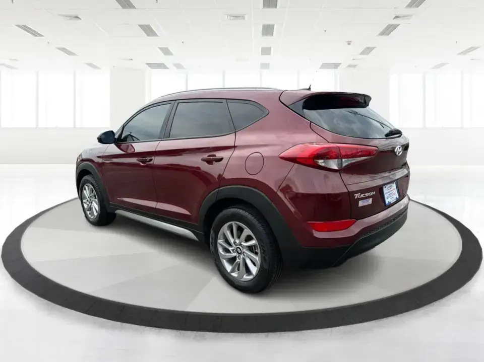 2017 Hyundai Tucson SE w/Preferred Package AWD (KM8J3CA42HU) with an 2.0L L4 DOHC 16V engine, 6A transmission, located at 1230 East Main St, Xenia, OH, 45385, (937) 908-9800, 39.688026, -83.910172 - Weekend getaways to John Bryan State Park, snowy school runs, and daily commutes down US-35 all ask for the same thing: a compact SUV that feels confident, comfortable, and ready for real life. This 2017 Hyundai Tucson SE w/Preferred Package AWD in Ruby Wine is a practical choice for drivers who wan- Photo#4