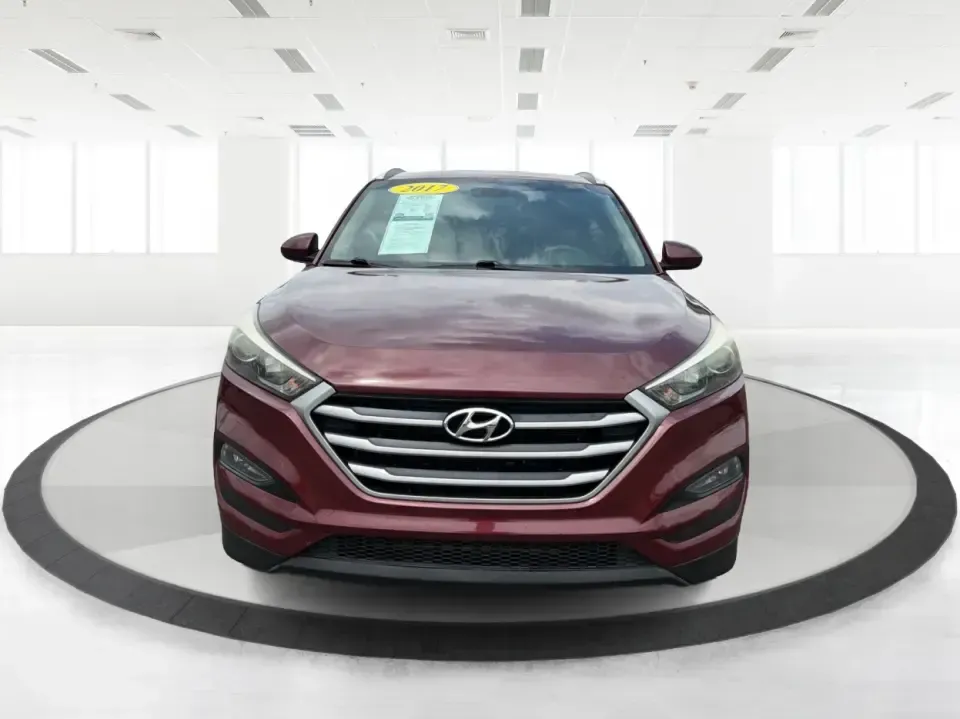 2017 Hyundai Tucson SE w/Preferred Package AWD (KM8J3CA42HU) with an 2.0L L4 DOHC 16V engine, 6A transmission, located at 1230 East Main St, Xenia, OH, 45385, (937) 908-9800, 39.688026, -83.910172 - Weekend getaways to John Bryan State Park, snowy school runs, and daily commutes down US-35 all ask for the same thing: a compact SUV that feels confident, comfortable, and ready for real life. This 2017 Hyundai Tucson SE w/Preferred Package AWD in Ruby Wine is a practical choice for drivers who wan- Photo#7