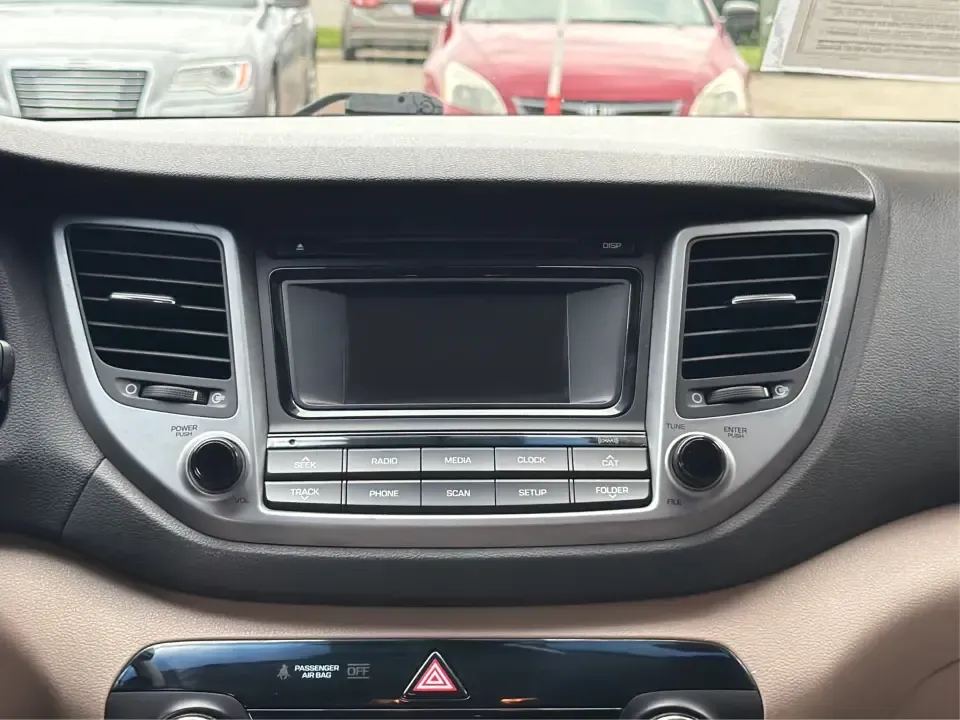 2017 Hyundai Tucson SE w/Preferred Package AWD (KM8J3CA42HU) with an 2.0L L4 DOHC 16V engine, 6A transmission, located at 1230 East Main St, Xenia, OH, 45385, (937) 908-9800, 39.688026, -83.910172 - Weekend getaways to John Bryan State Park, snowy school runs, and daily commutes down US-35 all ask for the same thing: a compact SUV that feels confident, comfortable, and ready for real life. This 2017 Hyundai Tucson SE w/Preferred Package AWD in Ruby Wine is a practical choice for drivers who wan- Photo#13