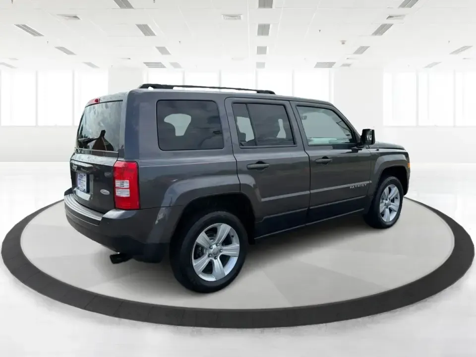 2014 Jeep Patriot Latitude 4WD (1C4NJRFB6ED) with an 2.4L L4 DOHC 16V engine, located at 1230 East Main St, Xenia, OH, 45385, (937) 908-9800, 39.688026, -83.910172 - Weekend escapes to John Bryan State Park, winter commutes down US-35, or everyday family errands around Xenia-this 2014 Jeep Patriot Latitude 4WD is built for the kind of Ohio life that doesn't stop when the weather changes. With confident four-wheel drive, practical SUV space for five, and a comfor- Photo#2