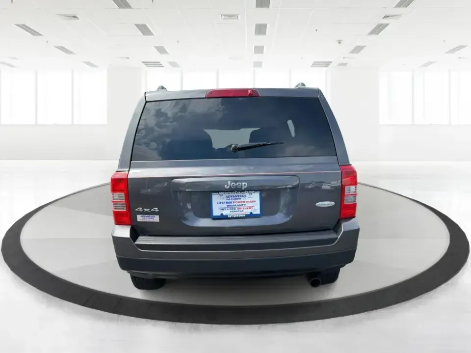 2014 Jeep Patriot Latitude 4WD (1C4NJRFB6ED) with an 2.4L L4 DOHC 16V engine, located at 1230 East Main St, Xenia, OH, 45385, (937) 908-9800, 39.688026, -83.910172 - Weekend escapes to John Bryan State Park, winter commutes down US-35, or everyday family errands around Xenia-this 2014 Jeep Patriot Latitude 4WD is built for the kind of Ohio life that doesn't stop when the weather changes. With confident four-wheel drive, practical SUV space for five, and a comfor- Photo#3