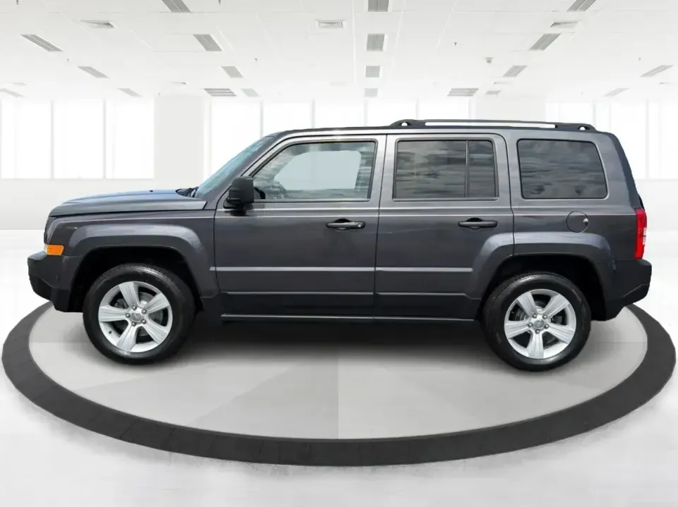 2014 Jeep Patriot Latitude 4WD (1C4NJRFB6ED) with an 2.4L L4 DOHC 16V engine, located at 1230 East Main St, Xenia, OH, 45385, (937) 908-9800, 39.688026, -83.910172 - Weekend escapes to John Bryan State Park, winter commutes down US-35, or everyday family errands around Xenia-this 2014 Jeep Patriot Latitude 4WD is built for the kind of Ohio life that doesn't stop when the weather changes. With confident four-wheel drive, practical SUV space for five, and a comfor- Photo#5