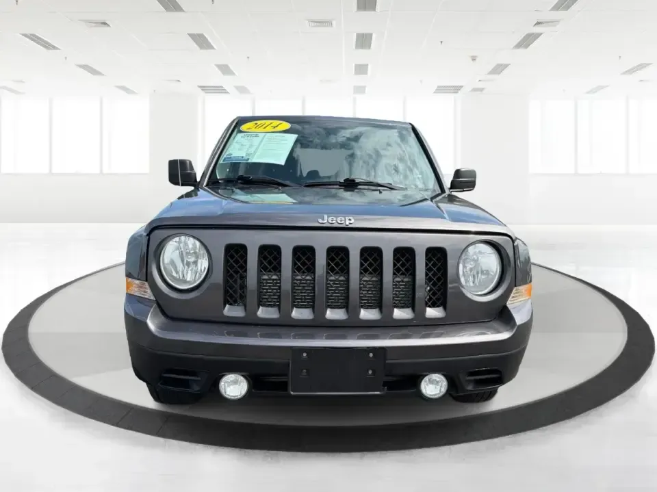2014 Jeep Patriot Latitude 4WD (1C4NJRFB6ED) with an 2.4L L4 DOHC 16V engine, located at 1230 East Main St, Xenia, OH, 45385, (937) 908-9800, 39.688026, -83.910172 - Weekend escapes to John Bryan State Park, winter commutes down US-35, or everyday family errands around Xenia-this 2014 Jeep Patriot Latitude 4WD is built for the kind of Ohio life that doesn't stop when the weather changes. With confident four-wheel drive, practical SUV space for five, and a comfor- Photo#7