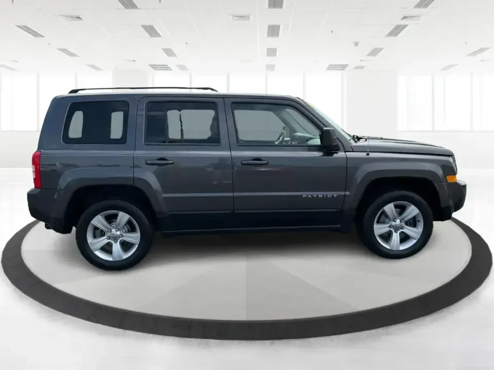2014 Jeep Patriot Latitude 4WD (1C4NJRFB6ED) with an 2.4L L4 DOHC 16V engine, located at 8750 N County Rd 25A, Piqua, OH, 45356, (937) 908-9800, 40.164391, -84.232513 - Weekend escapes to Indian Lake, snowy commutes up I75, or everyday school-and-grocery runs around Miami County-this 2014 Jeep Patriot Latitude 4WD is built for the kind of life that doesn't stop when the weather changes. With classic Jeep SUV practicality, seating for 5, and confident four-wheel dri- Photo#1
