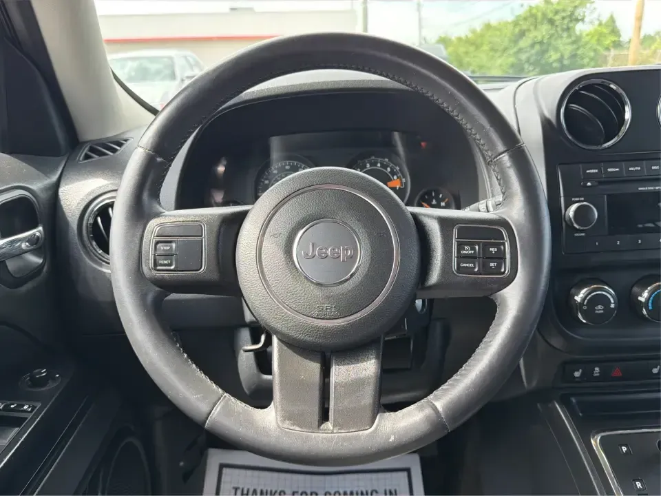 2014 Jeep Patriot Latitude 4WD (1C4NJRFB6ED) with an 2.4L L4 DOHC 16V engine, located at 8750 N County Rd 25A, Piqua, OH, 45356, (937) 908-9800, 40.164391, -84.232513 - Weekend escapes to Indian Lake, snowy commutes up I75, or everyday school-and-grocery runs around Miami County-this 2014 Jeep Patriot Latitude 4WD is built for the kind of life that doesn't stop when the weather changes. With classic Jeep SUV practicality, seating for 5, and confident four-wheel dri- Photo#15