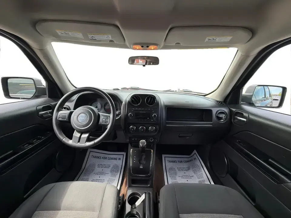 2014 Jeep Patriot Latitude 4WD (1C4NJRFB6ED) with an 2.4L L4 DOHC 16V engine, located at 8750 N County Rd 25A, Piqua, OH, 45356, (937) 908-9800, 40.164391, -84.232513 - Weekend escapes to Indian Lake, snowy commutes up I75, or everyday school-and-grocery runs around Miami County-this 2014 Jeep Patriot Latitude 4WD is built for the kind of life that doesn't stop when the weather changes. With classic Jeep SUV practicality, seating for 5, and confident four-wheel dri- Photo#18