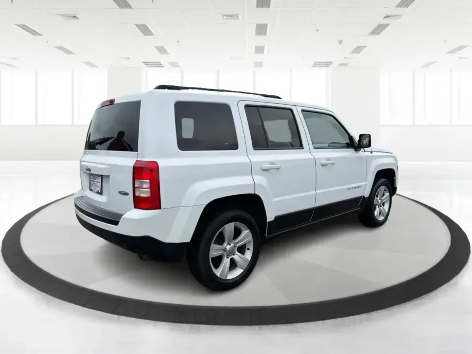 2013 Jeep Patriot Latitude 4WD (1C4NJRFBXDD) with an 2.4L L4 DOHC 16V engine, located at 4508 South Dixie Dr, Moraine, OH, 45439, (937) 908-9800, 39.689976, -84.218452 - Need an SUV that can handle Ohio weather, school drop-offs, and weekend getaways without feeling oversized? This 2013 Jeep Patriot Latitude 4WD is a practical, adventure-ready choice for commuters, growing families, and anyone who wants confident traction for rainy days on South Dixie Drive or snowy - Photo#2