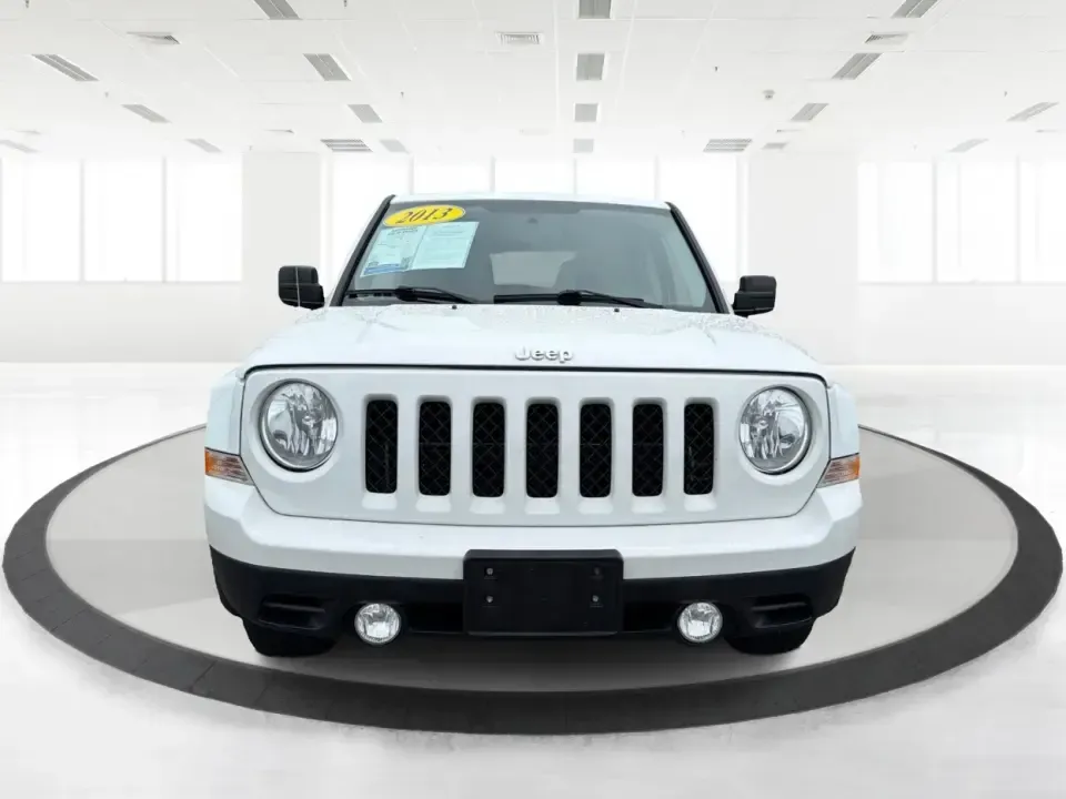 2013 Jeep Patriot Latitude 4WD (1C4NJRFBXDD) with an 2.4L L4 DOHC 16V engine, located at 4508 South Dixie Dr, Moraine, OH, 45439, (937) 908-9800, 39.689976, -84.218452 - Need an SUV that can handle Ohio weather, school drop-offs, and weekend getaways without feeling oversized? This 2013 Jeep Patriot Latitude 4WD is a practical, adventure-ready choice for commuters, growing families, and anyone who wants confident traction for rainy days on South Dixie Drive or snowy - Photo#7
