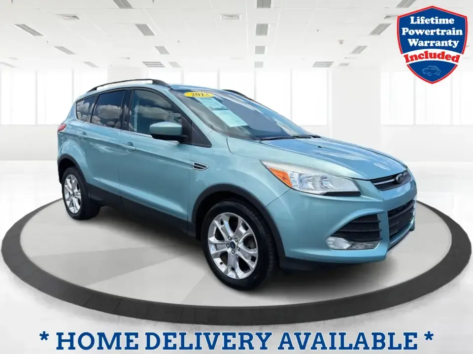 2013 Ford Escape SE FWD (1FMCU0G90DU) with an 2.0L L4 DOHC 16V engine, 6-Speed Automatic transmission, located at 1230 East Main St, Xenia, OH, 45385, (937) 908-9800, 39.688026, -83.910172 - Need a smart, right-sized SUV for busy weekdays and spontaneous weekends around Greene County? This 2013 Ford Escape SE FWD is a practical fit for commuters heading toward Dayton, parents juggling school drop-offs, and road-trippers looking for easy parking downtown Xenia-without giving up comfort,- Photo#0