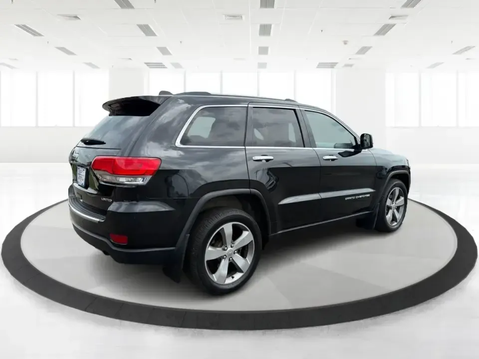 2014 Jeep Grand Cherokee Limited 4WD (1C4RJFBG8EC) with an 3.6L V6 DOHC 24V engine, 5-Speed Automatic transmission, located at 8750 N County Rd 25A, Piqua, OH, 45356, (937) 908-9800, 40.164391, -84.232513 - Need one SUV that can handle weekday commuting up I75, school drop-offs around Piqua, and spontaneous weekend getaways to the Great Miami River trails? This 2014 Jeep Grand Cherokee Limited 4WD brings the confident, all-season versatility Jeep is known for-wrapped in a sharp Brilliant Black Crystal- Photo#2