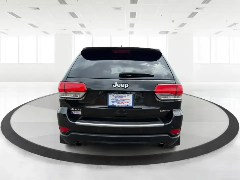 2014 Jeep Grand Cherokee Limited 4WD (1C4RJFBG8EC) with an 3.6L V6 DOHC 24V engine, 5-Speed Automatic transmission, located at 8750 N County Rd 25A, Piqua, OH, 45356, (937) 908-9800, 40.164391, -84.232513 - Need one SUV that can handle weekday commuting up I75, school drop-offs around Piqua, and spontaneous weekend getaways to the Great Miami River trails? This 2014 Jeep Grand Cherokee Limited 4WD brings the confident, all-season versatility Jeep is known for-wrapped in a sharp Brilliant Black Crystal- Photo#3
