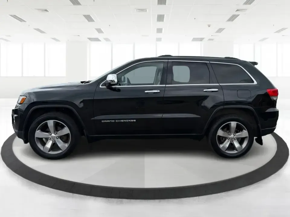 2014 Jeep Grand Cherokee Limited 4WD (1C4RJFBG8EC) with an 3.6L V6 DOHC 24V engine, 5-Speed Automatic transmission, located at 8750 N County Rd 25A, Piqua, OH, 45356, (937) 908-9800, 40.164391, -84.232513 - Need one SUV that can handle weekday commuting up I75, school drop-offs around Piqua, and spontaneous weekend getaways to the Great Miami River trails? This 2014 Jeep Grand Cherokee Limited 4WD brings the confident, all-season versatility Jeep is known for-wrapped in a sharp Brilliant Black Crystal- Photo#5