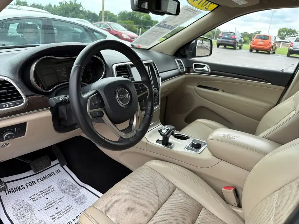 2014 Jeep Grand Cherokee Limited 4WD (1C4RJFBG8EC) with an 3.6L V6 DOHC 24V engine, 5-Speed Automatic transmission, located at 8750 N County Rd 25A, Piqua, OH, 45356, (937) 908-9800, 40.164391, -84.232513 - Need one SUV that can handle weekday commuting up I75, school drop-offs around Piqua, and spontaneous weekend getaways to the Great Miami River trails? This 2014 Jeep Grand Cherokee Limited 4WD brings the confident, all-season versatility Jeep is known for-wrapped in a sharp Brilliant Black Crystal- Photo#9