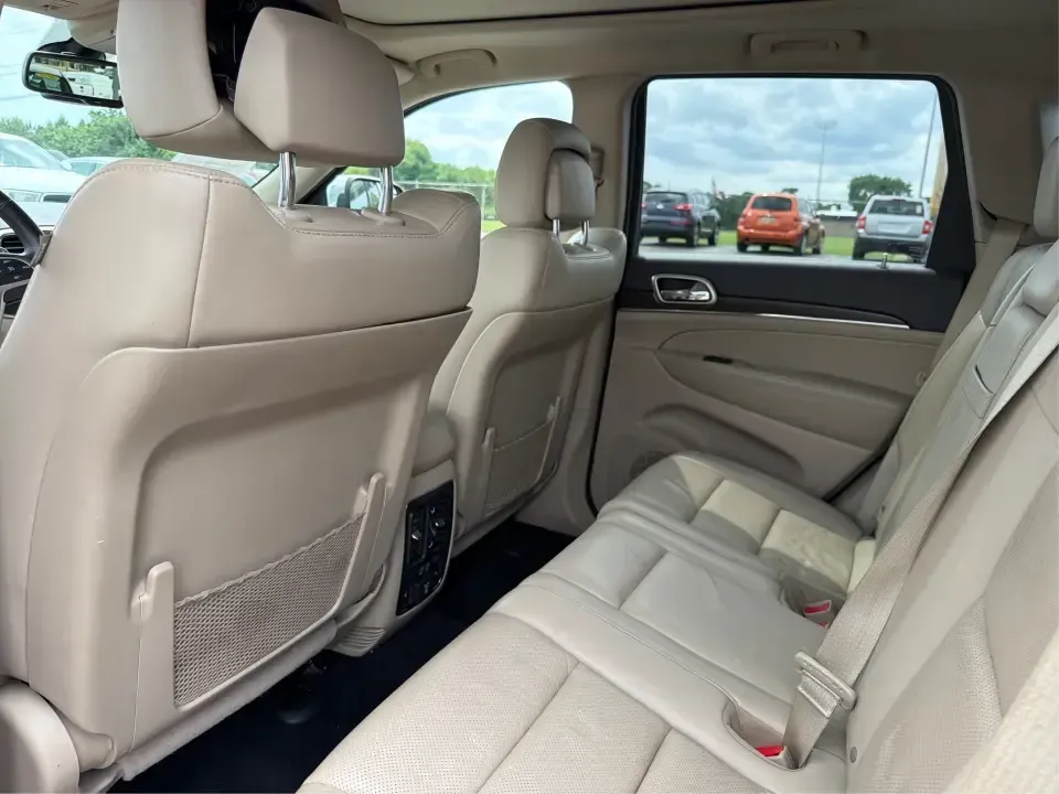 2014 Jeep Grand Cherokee Limited 4WD (1C4RJFBG8EC) with an 3.6L V6 DOHC 24V engine, 5-Speed Automatic transmission, located at 8750 N County Rd 25A, Piqua, OH, 45356, (937) 908-9800, 40.164391, -84.232513 - Need one SUV that can handle weekday commuting up I75, school drop-offs around Piqua, and spontaneous weekend getaways to the Great Miami River trails? This 2014 Jeep Grand Cherokee Limited 4WD brings the confident, all-season versatility Jeep is known for-wrapped in a sharp Brilliant Black Crystal- Photo#10