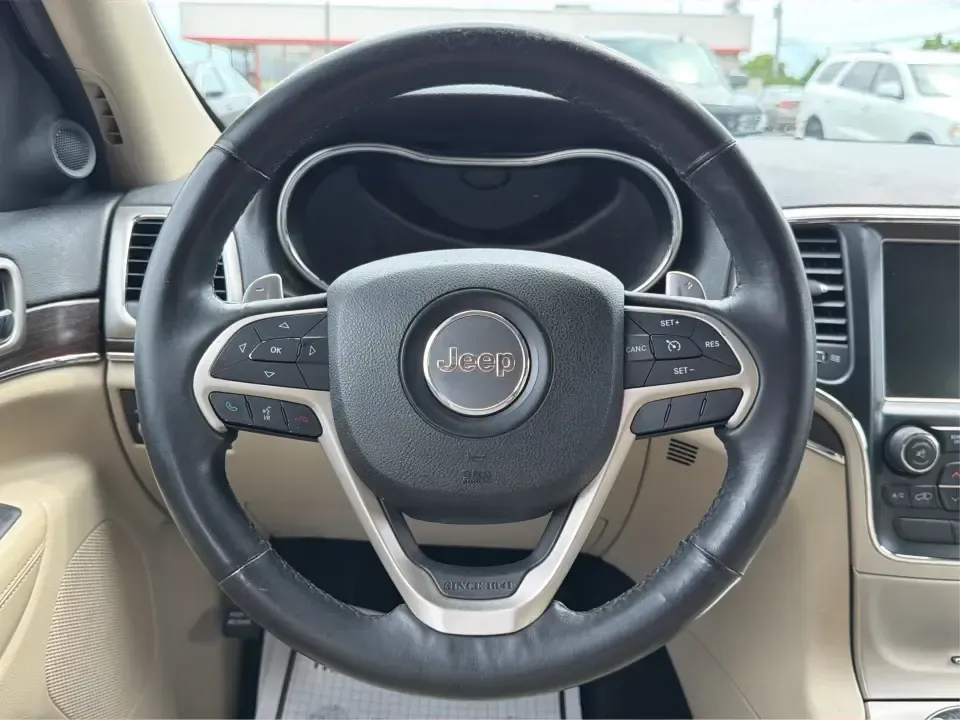 2014 Jeep Grand Cherokee Limited 4WD (1C4RJFBG8EC) with an 3.6L V6 DOHC 24V engine, 5-Speed Automatic transmission, located at 8750 N County Rd 25A, Piqua, OH, 45356, (937) 908-9800, 40.164391, -84.232513 - Need one SUV that can handle weekday commuting up I75, school drop-offs around Piqua, and spontaneous weekend getaways to the Great Miami River trails? This 2014 Jeep Grand Cherokee Limited 4WD brings the confident, all-season versatility Jeep is known for-wrapped in a sharp Brilliant Black Crystal- Photo#16