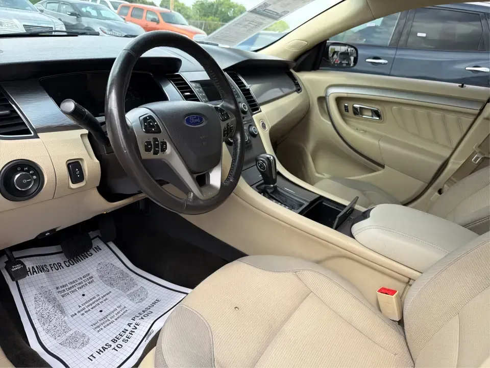 2015 Ford Taurus SEL FWD (1FAHP2E89FG) with an 3.5L V6 DOHC 24V engine, 6-Speed Automatic transmission, located at 1951 S Dayton Lakeview Rd., New Carlisle, OH, 45344, (937) 908-9800, 39.890999, -84.050255 - Need a comfortable, confident sedan for the daily commute, school drop-offs, and the occasional Dayton-to-Columbus road trip? This 2015 Ford Taurus SEL FWD is built for real life-roomy for five, smooth on longer drives, and packed with the kind of features that make every mile feel easier, whether y- Photo#9