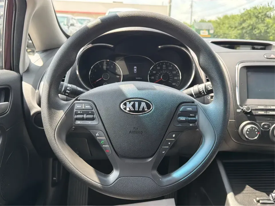 2018 Kia Forte LX 6M (3KPFL4A79JE) with an 2.0L L4 DOHC 16V engine, 6M transmission, located at 1951 S Dayton Lakeview Rd., New Carlisle, OH, 45344, (937) 908-9800, 39.890999, -84.050255 - Need a dependable commuter that still feels comfortable for date night in Dayton, errands in Springfield, and quick weekend getaways toward Yellow Springs? This **2018 Kia Forte LX 6M** is a smart, budget-friendly sedan that fits real life in **New Carlisle, Ohio**-easy to park, efficient to run, an- Photo#16