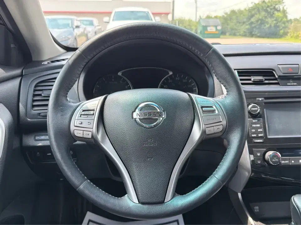 2015 Nissan Altima 2.5 S (1N4AL3AP1FN) with an 2.5L L4 DOHC 16V engine, Continuously Variable Transmission transmission, located at 401 Woodman Dr, Riverside, OH, 45431, (937) 908-9800, 39.760899, -84.123421 - Need a dependable sedan for the daily commute down I-675, quick school drop-offs, and easy weekend runs to The Greene or Downtown Dayton? This 2015 Nissan Altima 2.5 S in Super Black fits that real-life rhythm with excellent fuel economy, comfortable seating for five, and the kind of driver-friendly- Photo#16