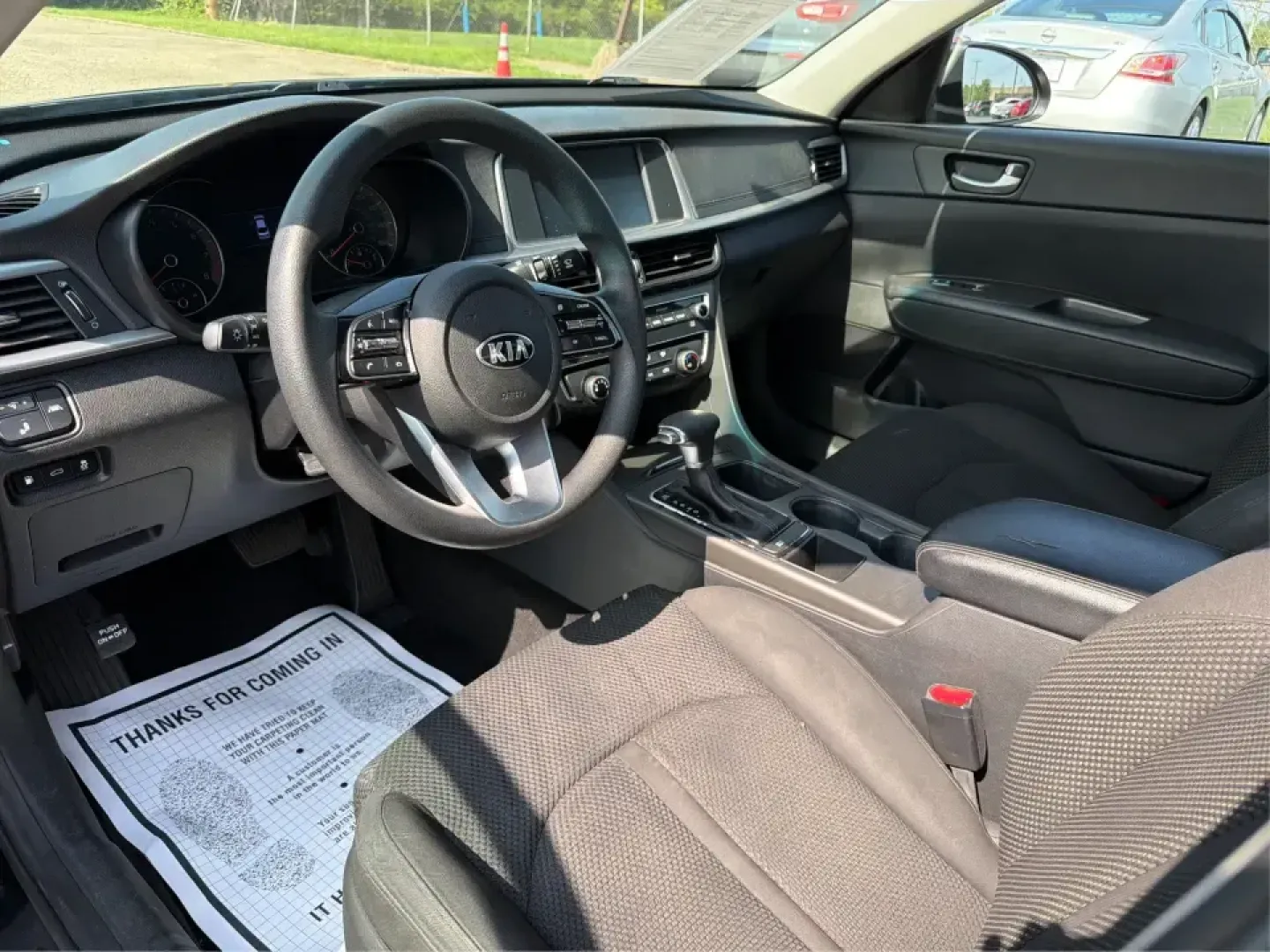 2019 Kia Optima LX (5XXGT4L39KG) with an 2.4L L4 DOHC 16V engine, 6A transmission, located at 880 E. National Road, Vandalia, OH, 45377, (937) 908-9800, 39.891918, -84.183594 - Need a comfortable, fuel-friendly sedan for the daily commute from Vandalia to Dayton-or a reliable road-trip partner for weekends at the National Museum of the U.S. Air Force? This 2019 Kia Optima LX is built for real life: roomy for five, easy to park, and smooth on I75 runs, errands along E. Nati- Photo#9