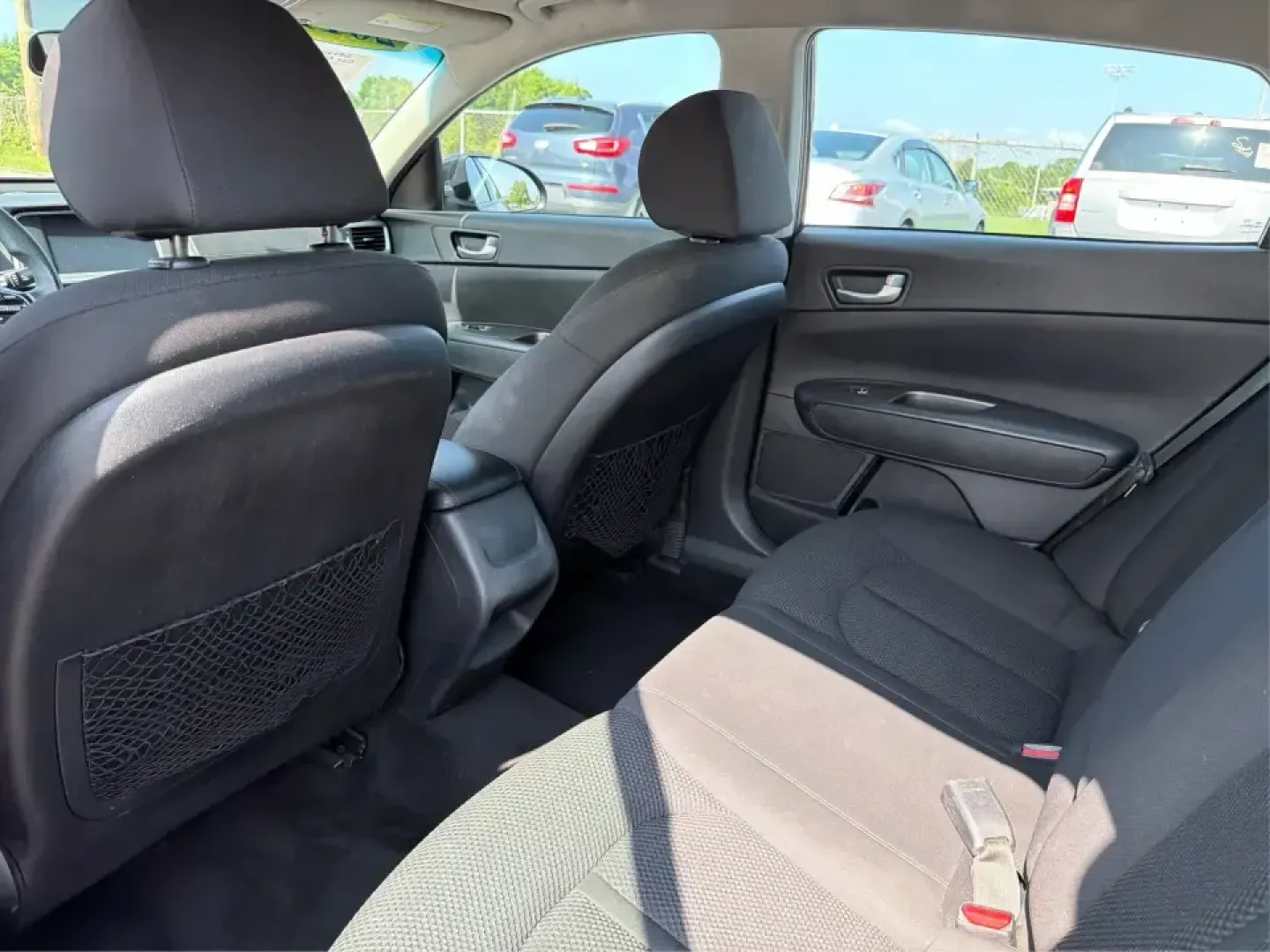2019 Kia Optima LX (5XXGT4L39KG) with an 2.4L L4 DOHC 16V engine, 6A transmission, located at 880 E. National Road, Vandalia, OH, 45377, (937) 908-9800, 39.891918, -84.183594 - Need a comfortable, fuel-friendly sedan for the daily commute from Vandalia to Dayton-or a reliable road-trip partner for weekends at the National Museum of the U.S. Air Force? This 2019 Kia Optima LX is built for real life: roomy for five, easy to park, and smooth on I75 runs, errands along E. Nati- Photo#10