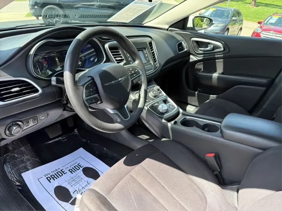 2015 Chrysler 200 Limited (1C3CCCAB9FN) with an 2.4L L4 DOHC 16V engine, 9-Speed Automatic transmission, located at 4508 South Dixie Dr, Moraine, OH, 45439, (937) 908-9800, 39.689976, -84.218452 - Need a comfortable, tech-savvy sedan that fits real life-school drop-offs, I-75 commutes, and weekend errands around Dayton-without feeling bare-bones? This **2015 Chrysler 200 Limited** is a smart pick for drivers who want an upscale cabin, modern convenience, and efficient everyday drivability in- Photo#9