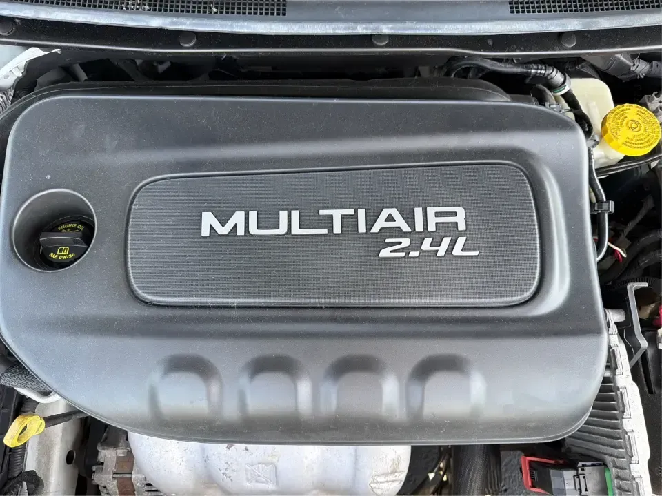 2015 Chrysler 200 Limited (1C3CCCAB9FN) with an 2.4L L4 DOHC 16V engine, 9-Speed Automatic transmission, located at 4508 South Dixie Dr, Moraine, OH, 45439, (937) 908-9800, 39.689976, -84.218452 - Need a comfortable, tech-savvy sedan that fits real life-school drop-offs, I-75 commutes, and weekend errands around Dayton-without feeling bare-bones? This **2015 Chrysler 200 Limited** is a smart pick for drivers who want an upscale cabin, modern convenience, and efficient everyday drivability in- Photo#11