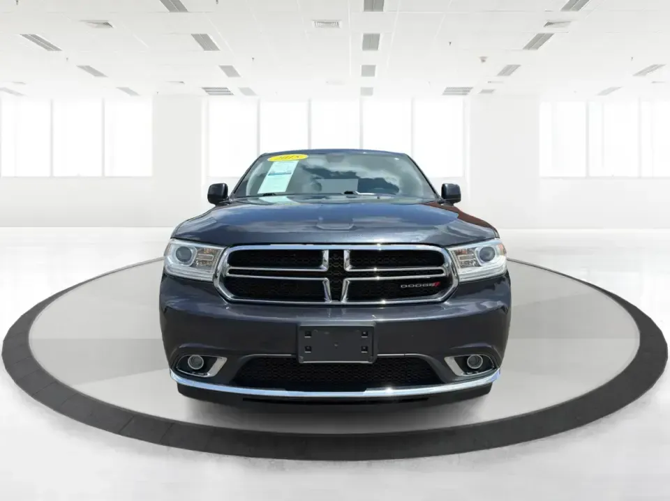 2015 Dodge Durango SXT AWD (1C4RDJAGXFC) with an 3.6L V6 DOHC 24V engine, 8-Speed Automatic transmission, located at 8750 N County Rd 25A, Piqua, OH, 45356, (937) 908-9800, 40.164391, -84.232513 - Need one SUV that can handle the school run, a long I75 commute, and a packed weekend at Indian Lake without feeling cramped? This 2015 Dodge Durango SXT AWD is built for real life in West Central Ohio-roomy for up to seven passengers, confident in changing weather, and versatile enough for everythi- Photo#7